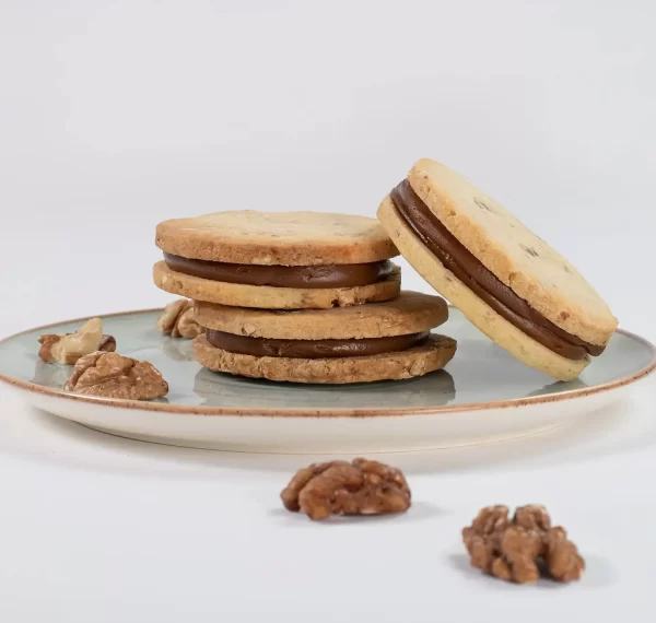 alfajor-nuez-entero-e1742861301398.webp Alfajor de Nuez y Dulce de Leche